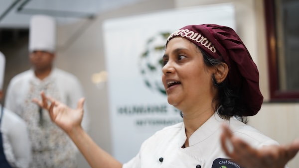 Chef Susmitha Veganosaurus. India vegan chef. Teaching a plant based culinary workshop at a hospitality college.